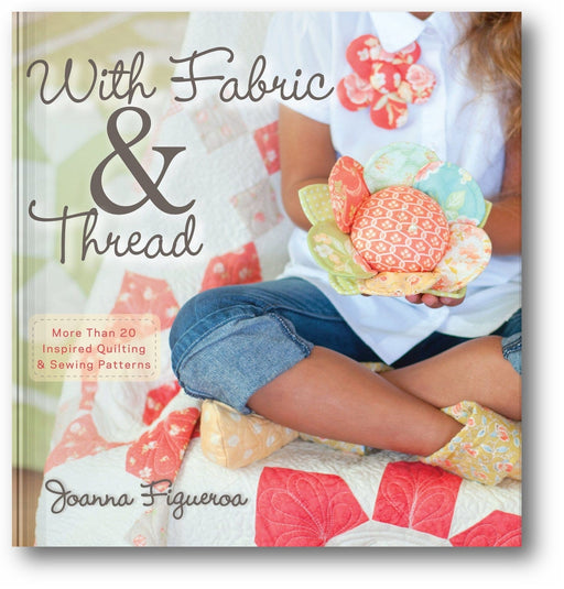 With Fabric and Thread: More Than 20 Inspired Quilting and Sewing Patterns book cover